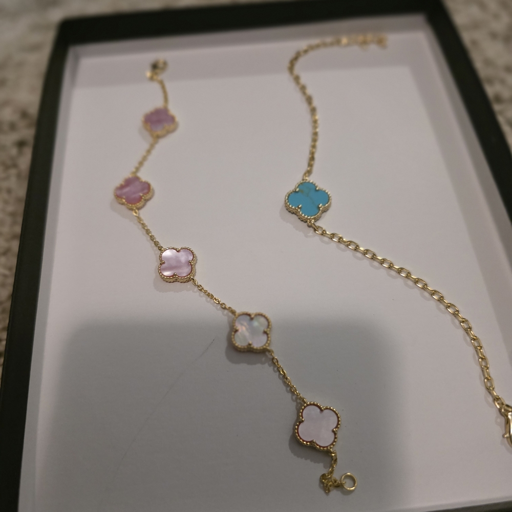 Elegant Gold Bracelet with Pastel Charms